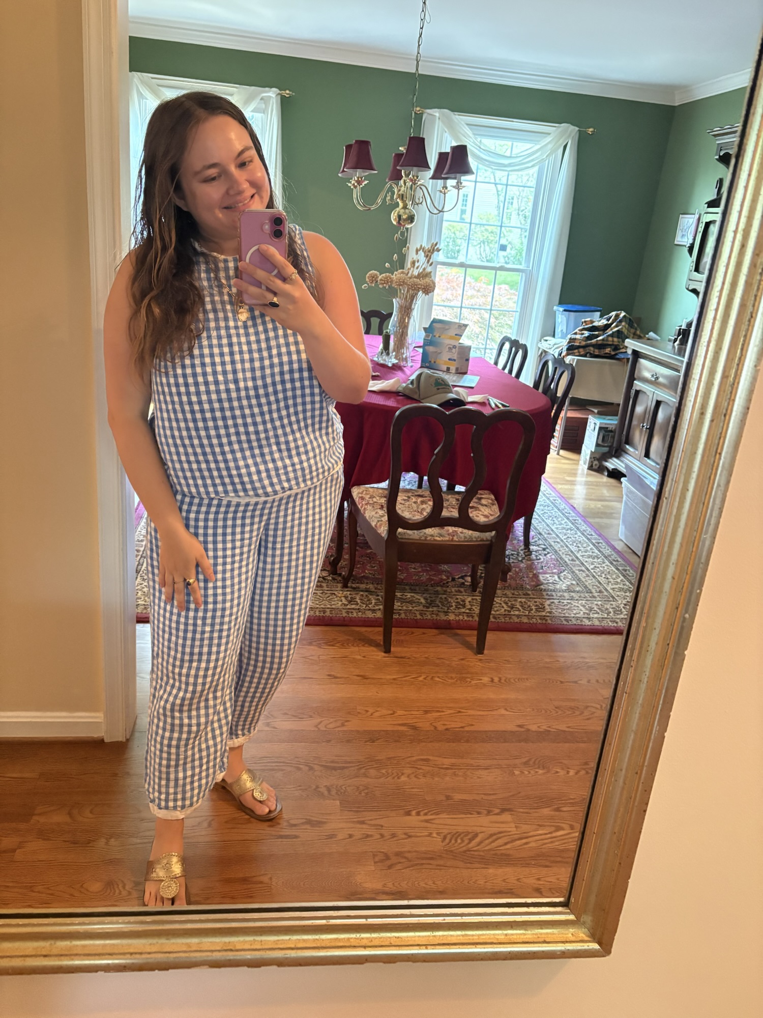 pink chickadee wearing a blue and white gingham matching lounge set